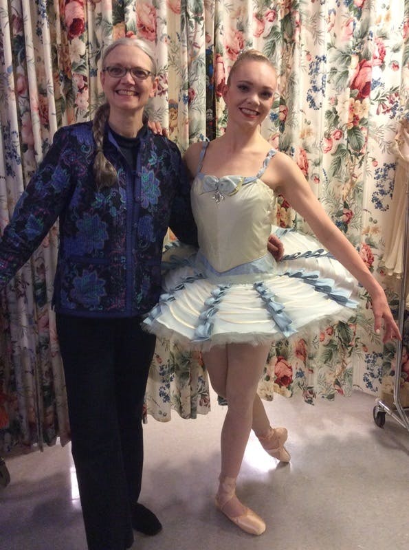 I am with my daughter, a professional ballet dancer, in her tutu just before a performance - she is the inspiration for this book!